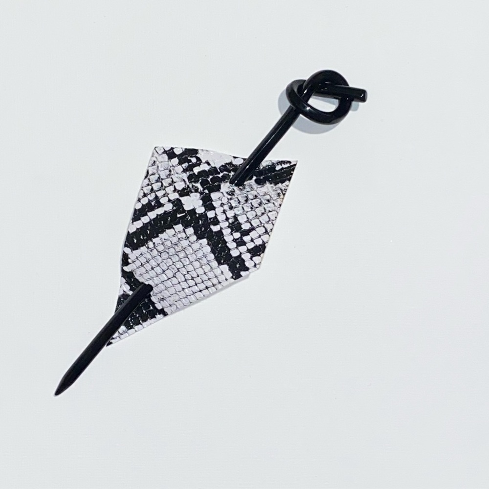 Chopstick/leather piece